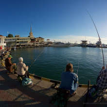 Рыбаки у морского порта Сочи. Fishermen at the sea port of Sochi