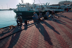 Рыбаки у  Морского порта Сочи